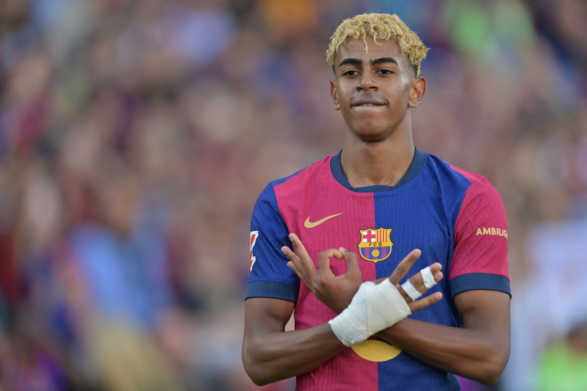 Barcelona's Spanish forward #19 Lamine Yamal celebrates scoring an equalizing goal during the Spanish league football match between FC Barcelona and Villarreal CF at Estadi Olimpic Lluis Companys in Barcelona on May 18, 2025. (Photo by MANAURE QUINTERO / AFP)