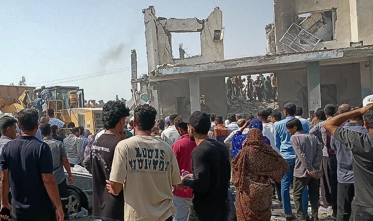 This picture obtained from Iran's ISNA news agency shows the site of a strike on a girls' school in Minab, in Iran's southern Hormozgan province, on February 28, 2026. The United States and Israel launched strikes against Iran on February 28, with Israel's public broadcaster reporting that supreme leader Ayatollah Ali Khamenei had been targeted, as the Islamic republic retaliated with barrages of missiles at Gulf states and Israel. ALI NAJAFI / ISNA / AFP